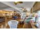 Open floorplan showcasing living and dining areas with natural light and comfortable seating at 8869 Marsh Aire Ln, Edisto Island, SC 29438