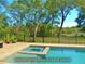 Enjoy unobstructed marsh views from the private pool and spa, creating a serene outdoor retreat at 8869 Marsh Aire Ln, Edisto Island, SC 29438