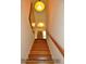 Hardwood staircase to 2nd level at 8869 Marsh Aire Ln, Edisto Island, SC 29438