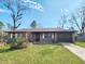 Charming single story home with a brick facade, well-manicured lawn, and an attached one car garage at 9 Grover Ln, Goose Creek, SC 29445