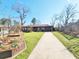 Charming single story home with a brick facade, well-manicured lawn, and an attached one car garage at 9 Grover Ln, Goose Creek, SC 29445
