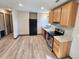 Bright kitchen features light wood cabinets, stainless steel appliances, and hardwood floors at 9 Grover Ln, Goose Creek, SC 29445