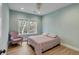 Bedroom with charming decor, comfortable bed, and a cozy chair for a relaxing retreat at 915 Dill Ave, Charleston, SC 29412