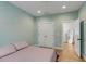 Bright bedroom with minimalist decor, large closet, and hardwood floors at 915 Dill Ave, Charleston, SC 29412
