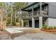 Stunning home exterior with a spacious deck, featuring two garage spaces and ample parking at 915 Dill Ave, Charleston, SC 29412