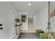 Bright foyer with stylish rug and a view of the staircase leading to the upper level at 915 Dill Ave, Charleston, SC 29412