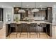 Modern kitchen with a large island featuring a marble countertop and pendant lighting at 915 Dill Ave, Charleston, SC 29412
