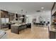 Bright, open kitchen with modern appliances, island seating, and adjacent dining area at 915 Dill Ave, Charleston, SC 29412