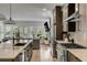 Modern kitchen featuring stainless steel appliances and an island with seating at 915 Dill Ave, Charleston, SC 29412