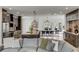 Open-concept living space with a kitchen, dining area, and comfortable seating area at 915 Dill Ave, Charleston, SC 29412