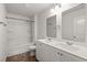 Bright bathroom featuring a shower-tub combo and a double vanity with ample counter space at 9747 Roseberry Street, Ladson, SC 29456
