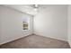 Bedroom with neutral carpet, ceiling fan, and natural light from the window at 9747 Roseberry Street, Ladson, SC 29456