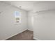 Walk-in closet showcasing wire shelving and natural light from the window at 9747 Roseberry Street, Ladson, SC 29456
