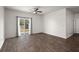Living room features a glass sliding door with backyard access at 9747 Roseberry Street, Ladson, SC 29456