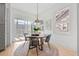 Dining room with hardwood floors and large windows for natural light at 1013 Barfield St, Charleston, SC 29492
