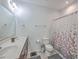 Bright bathroom with dual vanity, fresh white walls, and a shower-tub combination at 106 Kirkland St, Goose Creek, SC 29445