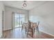 Cozy dining area with modern table and chairs, adjacent to sliding glass doors at 106 Kirkland St, Goose Creek, SC 29445