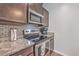Modern kitchen featuring granite countertops and stainless steel appliances at 106 Kirkland St, Goose Creek, SC 29445
