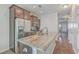 Spacious kitchen featuring stainless steel appliances and a large center island at 106 Kirkland St, Goose Creek, SC 29445