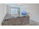 Inviting living room with a large sectional, window, and a wall-mounted television at 106 Kirkland St, Goose Creek, SC 29445