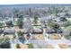 Aerial view of homes in a residential neighborhood with tree coverage and one property highlighted with a backyard pool at 106 Rachel St, Goose Creek, SC 29445