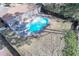 Inviting backyard with a sparkling blue swimming pool, diving board, and privacy fence at 106 Rachel St, Goose Creek, SC 29445