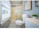 Bathroom with a white toilet, a vanity and a shower behind a sliding glass door at 106 Rachel St, Goose Creek, SC 29445