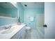Bathroom featuring light blue walls, vanity, toilet, and shower at 106 Rachel St, Goose Creek, SC 29445