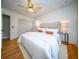 Bright bedroom featuring a ceiling fan, hardwood floors, large closet and a plush king sized bed at 106 Rachel St, Goose Creek, SC 29445