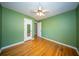 Bright bedroom with hardwood floors, a closet, and a ceiling fan at 106 Rachel St, Goose Creek, SC 29445