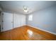 Bedroom featuring hardwood floors, a ceiling fan, closet and great light at 106 Rachel St, Goose Creek, SC 29445
