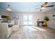 Bright dining room with French doors, a ceiling fan, and tile flooring at 106 Rachel St, Goose Creek, SC 29445