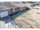 Charming brick home featuring red shutters, well-maintained landscaping, and an attached garage at 106 Rachel St, Goose Creek, SC 29445