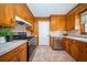 Efficient kitchen with stainless steel appliances, wood cabinetry, and ample counter space at 106 Rachel St, Goose Creek, SC 29445
