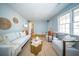 Living room with a fireplace, light blue walls and decorative accents at 106 Rachel St, Goose Creek, SC 29445
