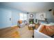 Comfortable living room with a fireplace, large windows, and a welcoming atmosphere at 106 Rachel St, Goose Creek, SC 29445