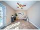 Home office space with tiled floors, natural light, ceiling fan, and modern accents at 106 Rachel St, Goose Creek, SC 29445