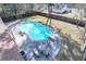 Backyard pool with diving board, patio, and fencing provides a private space for outdoor enjoyment and entertaining at 106 Rachel St, Goose Creek, SC 29445