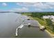 Expansive waterfront view featuring multiple docks, boat slips, and access to the waterway at 108 Fairbanks Oak Aly # 201, Charleston, SC 29492