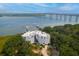 Beautiful aerial shot of condo building with dock and Charleston bridge in the background at 108 Fairbanks Oak Aly # 201, Charleston, SC 29492