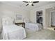 Bedroom with two beds, carpet flooring, and closet at 108 Fairbanks Oak Aly # 201, Charleston, SC 29492