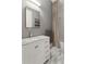 Bathroom featuring a marble countertop vanity, mirror, and tiled shower at 121 Jakes Ln, Mount Pleasant, SC 29464
