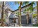 Attractive multi-story home with palm trees, dual balconies, gray exterior, and dark brown trim at 121 Jakes Ln, Mount Pleasant, SC 29464