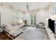 Comfortable living room with white walls, sectional sofa, stylish decor, and plenty of natural light at 121 Jakes Ln, Mount Pleasant, SC 29464