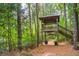 Wood observation deck with railing surrounded by trees at 121 Jakes Ln, Mount Pleasant, SC 29464