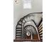 Unique staircase with a skylight above and decorative detailing on the walls below at 121 Jakes Ln, Mount Pleasant, SC 29464