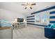 Cozy bedroom with a custom accent wall and neutral carpeting at 121 Warbler Way, Summerville, SC 29483
