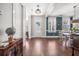 Dining room leading to the front entrance and featuring hardwood floors at 121 Warbler Way, Summerville, SC 29483