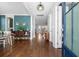 Open foyer with hardwood floors, leading to the dining room at 121 Warbler Way, Summerville, SC 29483