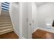 Hallway with access to stairs and pet door at 121 Warbler Way, Summerville, SC 29483